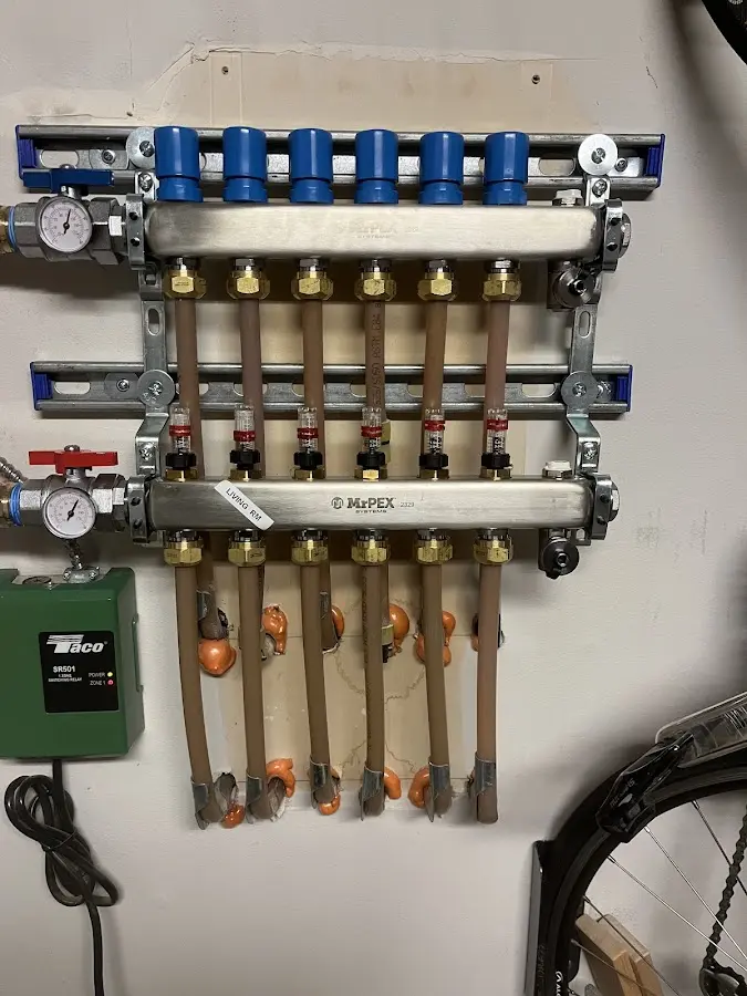 Plumber performing Gas Line Installation at a residential property in Avon